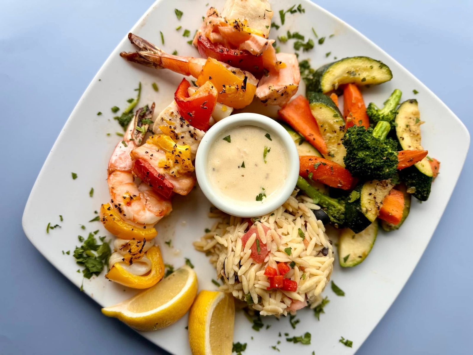 Grilled seafood skewers platter